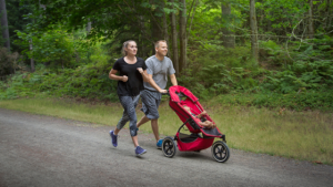 couple-jogging-baby-stroller